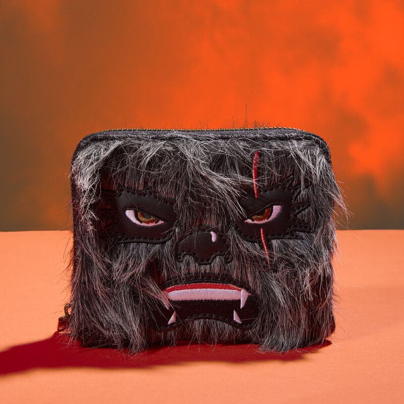 Furry zip around wallet featuring the character Krrsantan from Star Wars against an orange background
